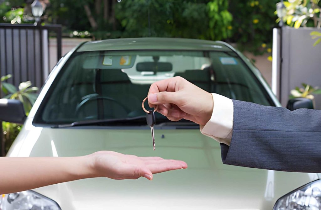 Used car dealers Venice FL key handover showing trust and transaction between seller and buyer